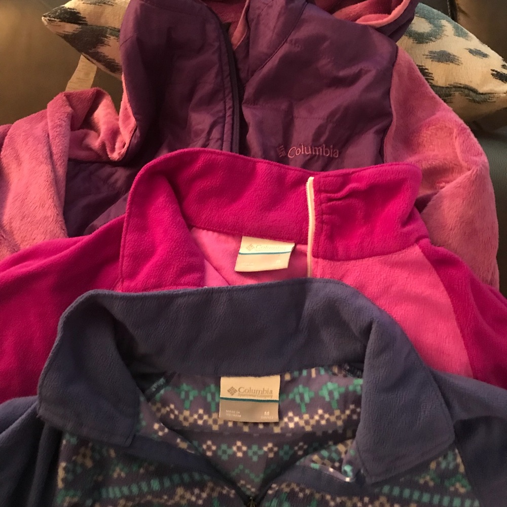 Three girls’ Columbia jackets